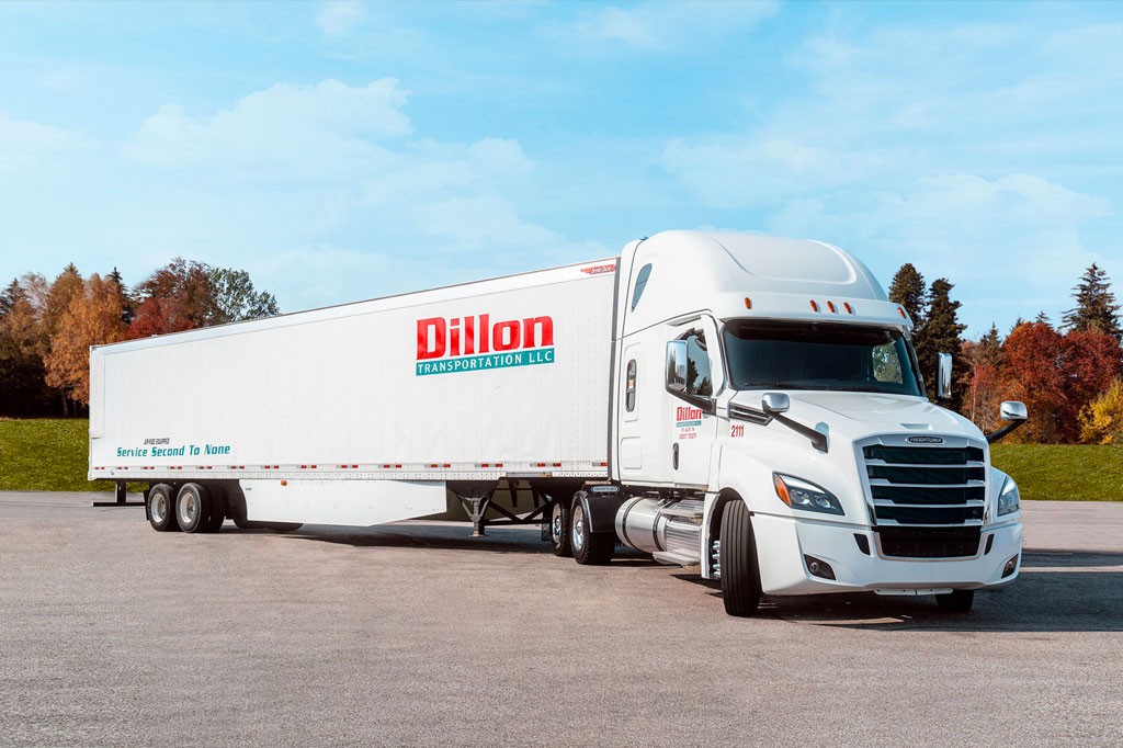 photo of white semi "dillon transportation" truck parked
