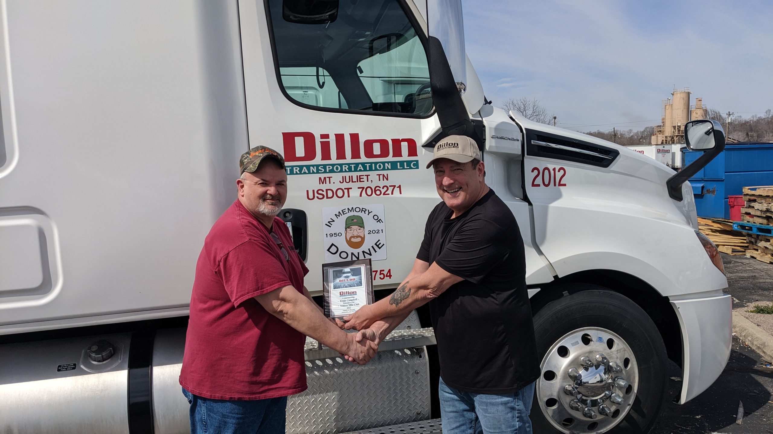 Ernie Campbell receiving his induction into Dillon Transportation's Million Mile Club.